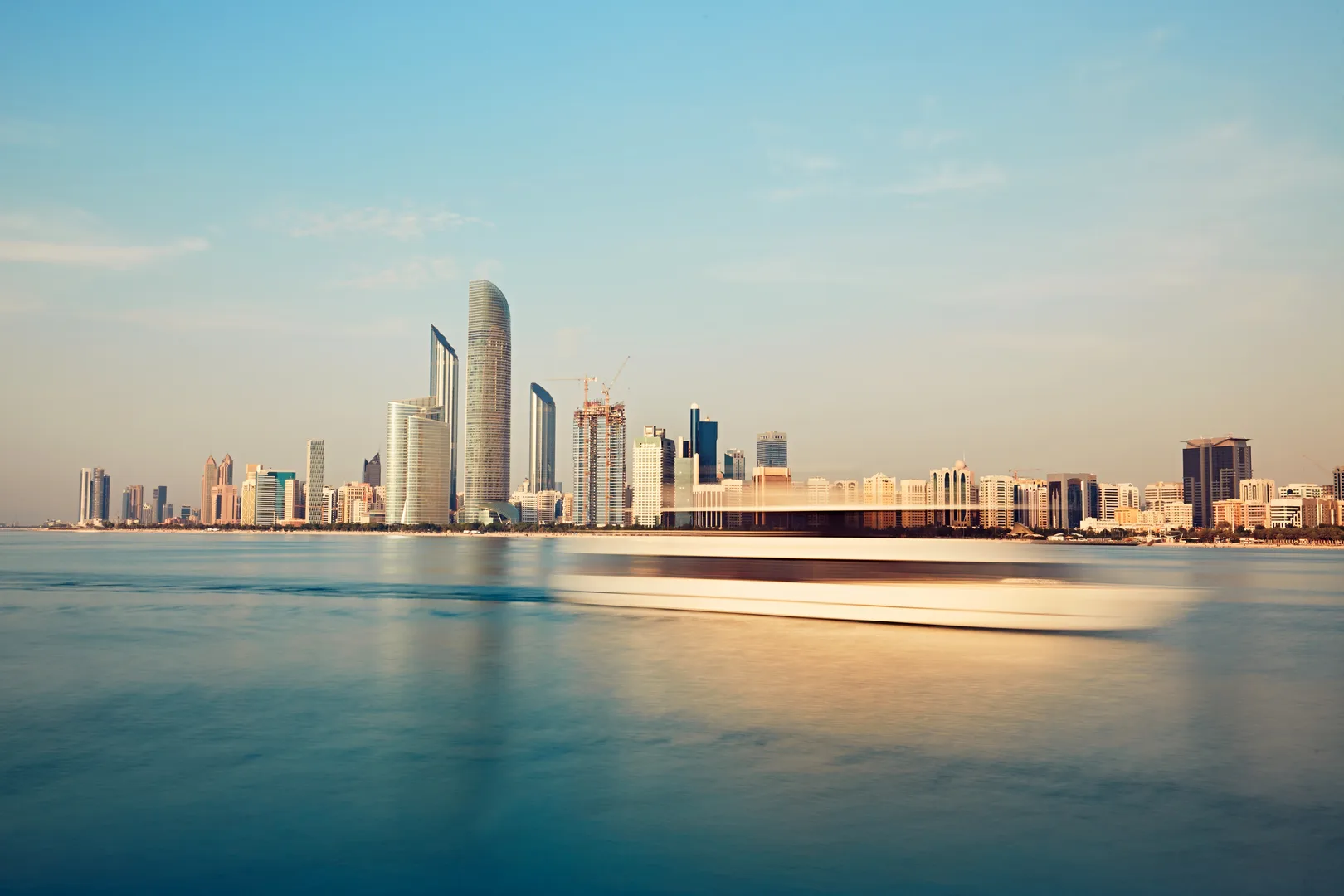 Dubai vs Abu Dhabi Real Estate: Where Should You Invest Your First AED 2 Million in 2026?