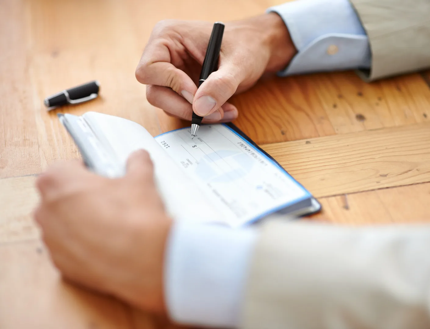 Dubai Rent Cheques Explained 2026: 1 vs 4 vs 12 Cheques & Post-Dated Rules